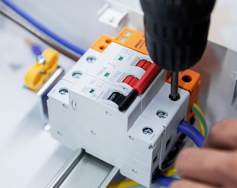 Employees assembling the distribution box